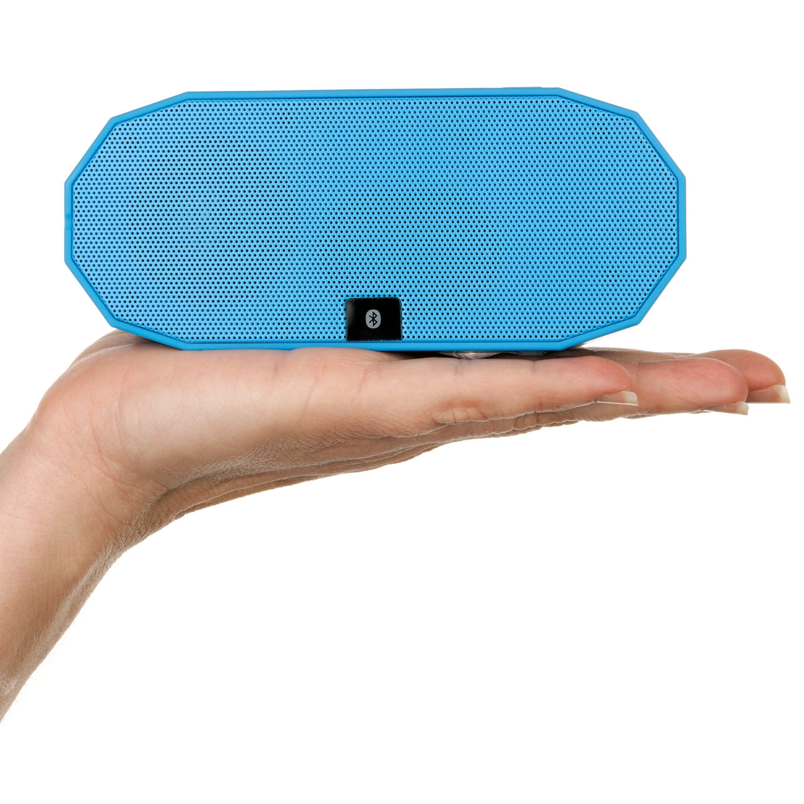 A Bluetooth speaker being hold by a hand model, on a white background.