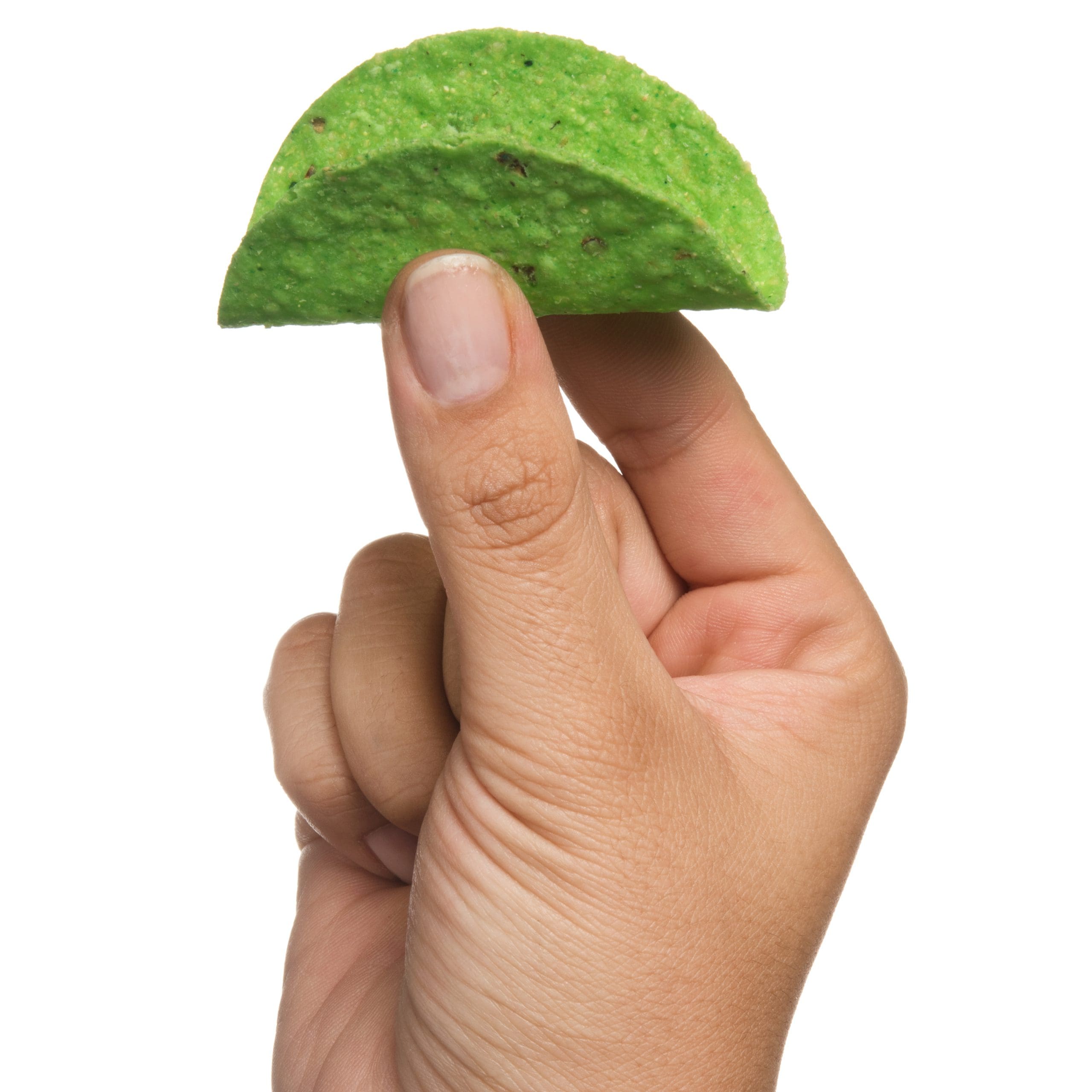 Hand model photograph holding a green miniature taco shell.