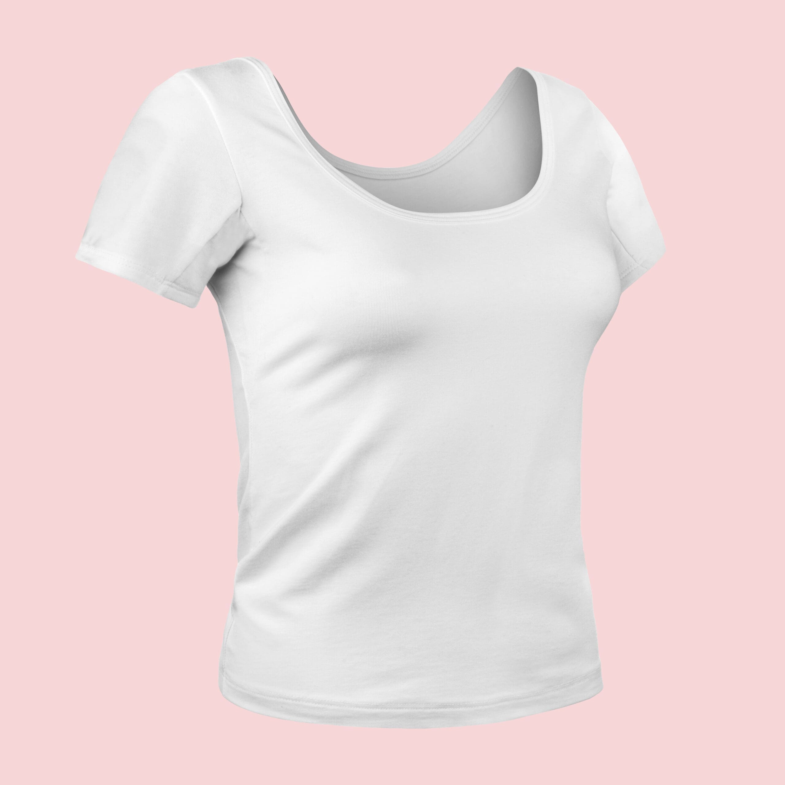 A ghost mannequin photo depicting a women's shirt on a pink background